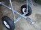 Heavy duty front wheels with draw bar for use by hand